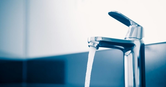 Faucet with flowing water
