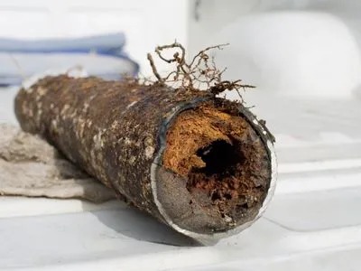 A rusty and clogged pipe