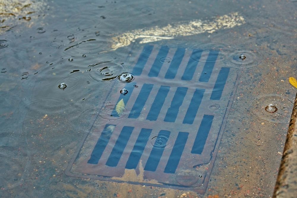 flooded sewer drain